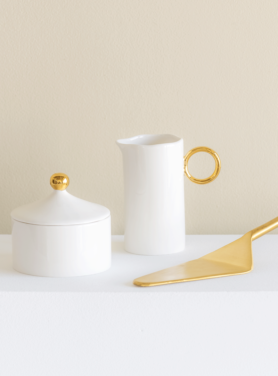 Melkkan wit met goud detail