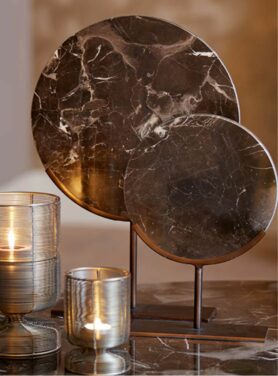 Schijf zwart marmer op gouden voet