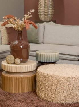 Ronde beige poef bouclé structuur keramieken salontafels