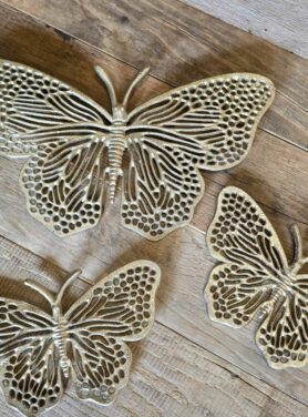 Gouden vlinders voor aan de muur